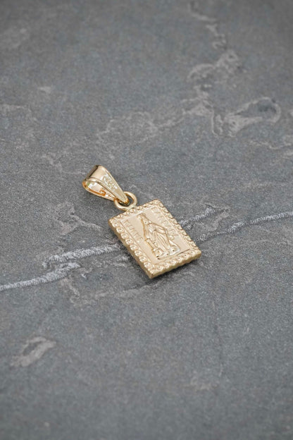 Dije Santa Barbara 0.5gr / 1.8cm / 7.8mm — Oro Amarillo