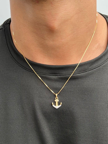 Dije ancla con swarovski blanco 1.55gr / Largo 2.2cm — Oro Amarillo