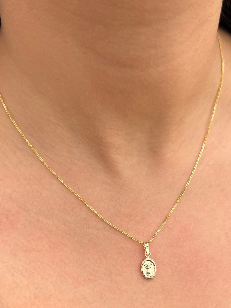 Dije Divino Niño 0.4gr / 1.8cm / 7.7mm — Oro Amarillo