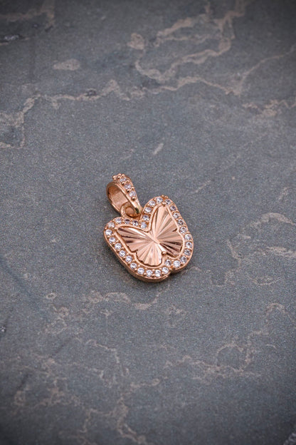 Dije mariposa con swarovski blanco 1.6gr / Largo 1.7cm / Oro Rosado Nac B