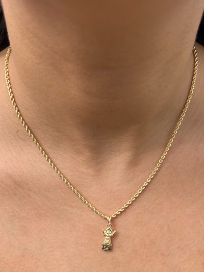 Dije divino niño 0.55gr / Largo 2.3cm / Oro Amarillo Nac B