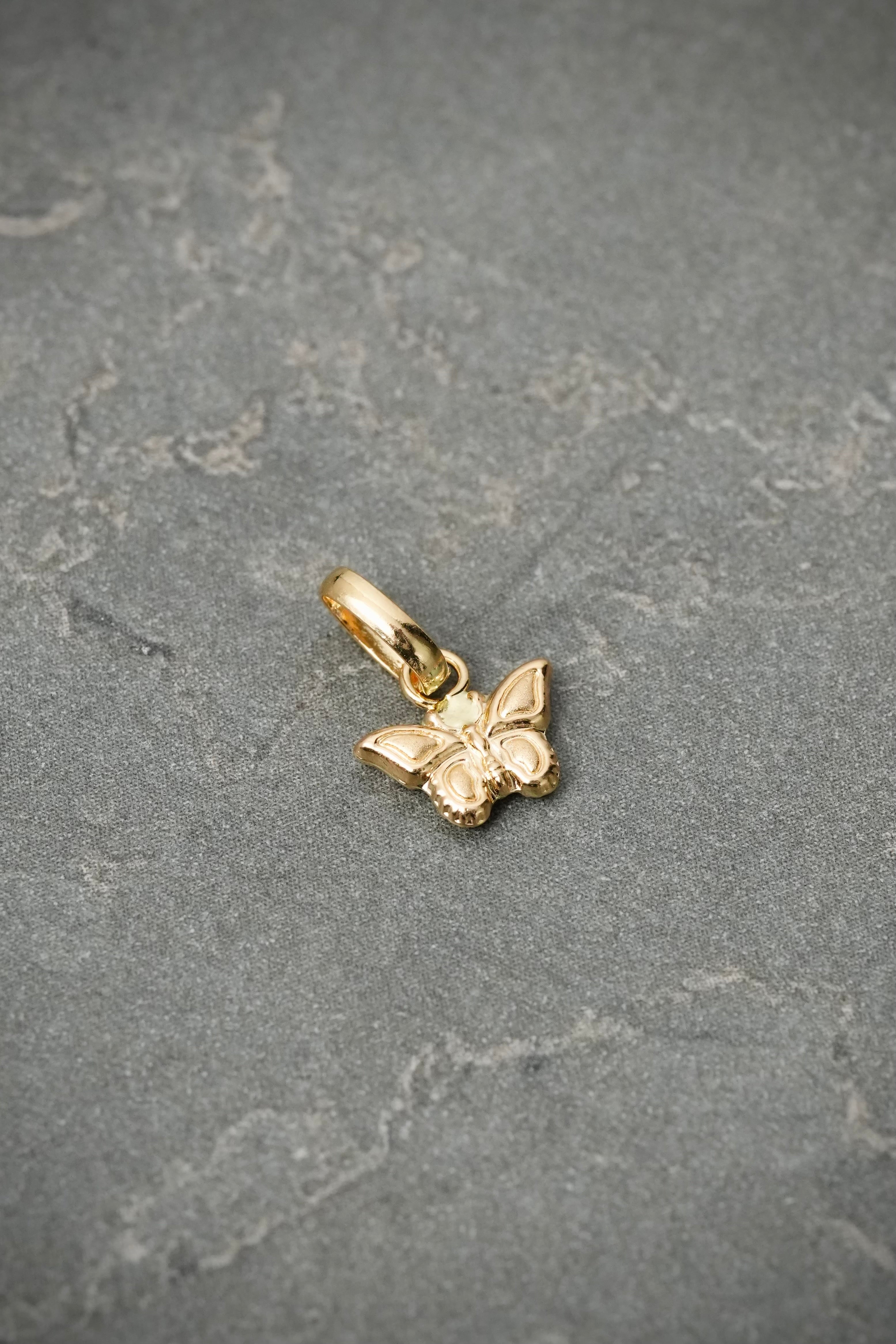 Dije mariposa 0.25gr / Largo 1.3cm — Oro Amarillo
