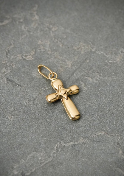 Dije cruz 0.3gr / Largo 1.7cm — Oro Amarillo