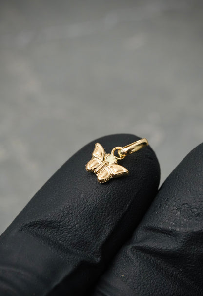 Dije mariposa 0.3gr / Largo 1.1cm — Oro Amarillo