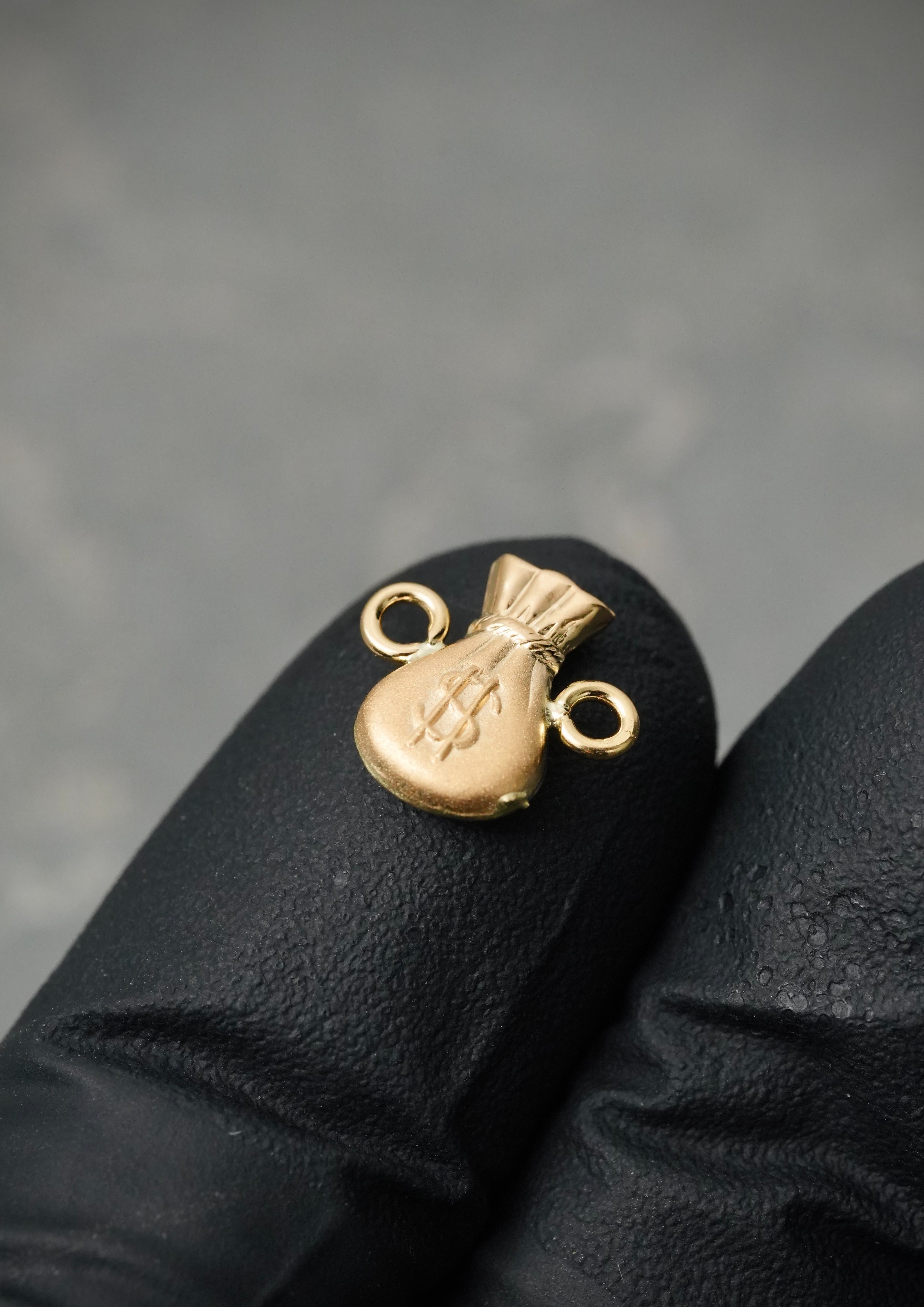 Herraje bolsa de dunero 0.4gr / Largo 1cm — Oro Amarillo