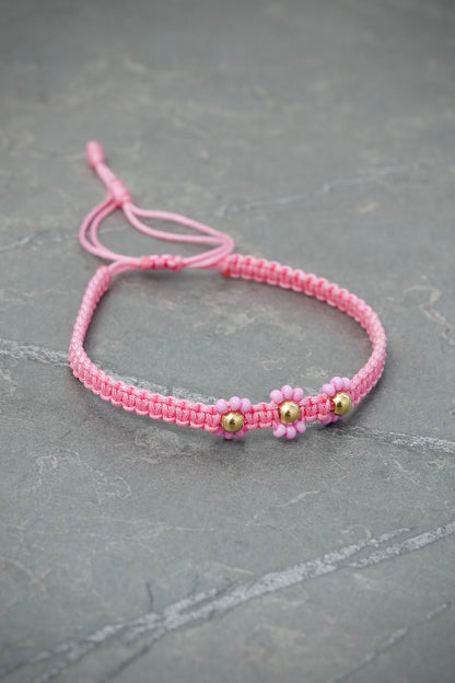 Pulsera en Hilo Rosado de Flores 0.25gr — Oro Amarillo