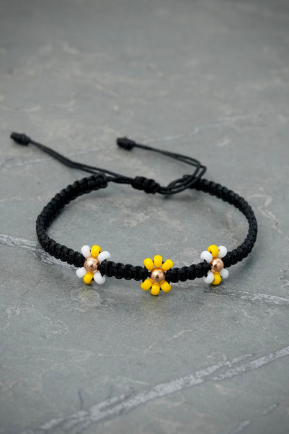 Pulsera en Hilo Negro de Flores 0.25gr — Oro Rosado