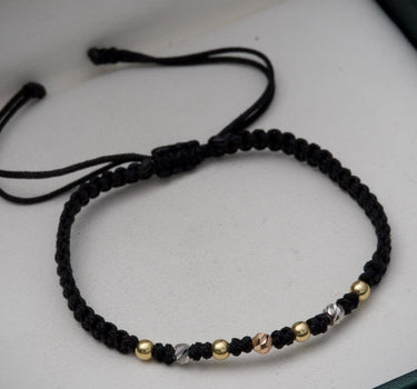 Pulsera en hilo negro con bolas lisas y diamantadas 3mm 0.35gr / Tres Oros (Joya) M