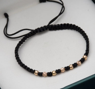 Pulsera en hilo negro con bolas lisas y diamantadas 3mm 0.35gr / Oro Rosado (Joya) M