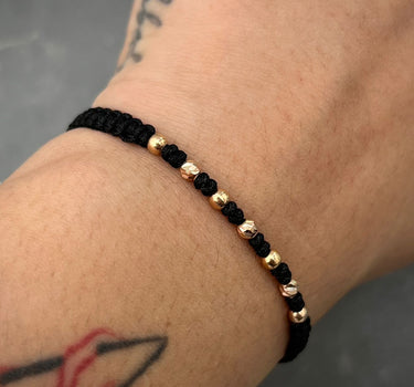 Pulsera en hilo negro con bolas lisas y diamantadas 3mm 0.35gr / Oro Rosado (Joya) M