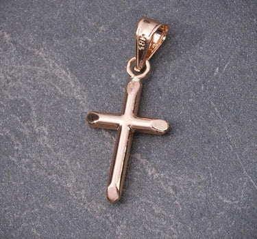 Dije de cruz lisa 0.5gr / Largo 2.5cm / Oro Rosado Nac M