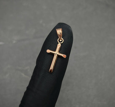 Dije de cruz lisa 0.4gr / Largo 2.2cm / Oro Rosado Nac M