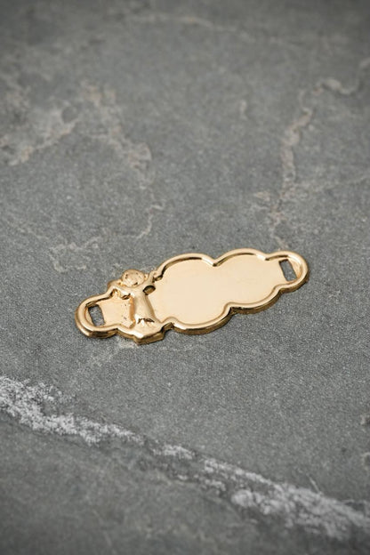 Herraje placa divino niño 0.55gr / Largo 2.2cm — Oro Amarillo