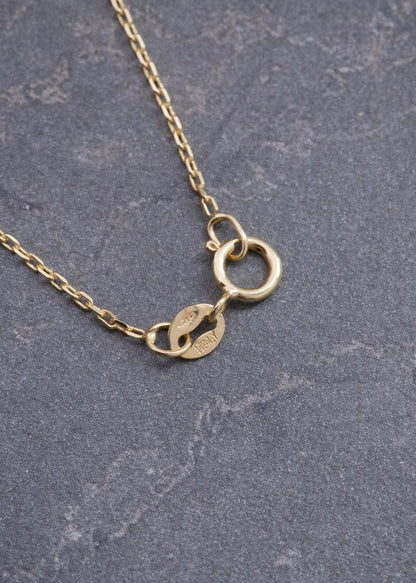 Cadena con Dije 10pts de Esmeralda 1.7gr / 45cm / 0.7mm — Oro Amarillo