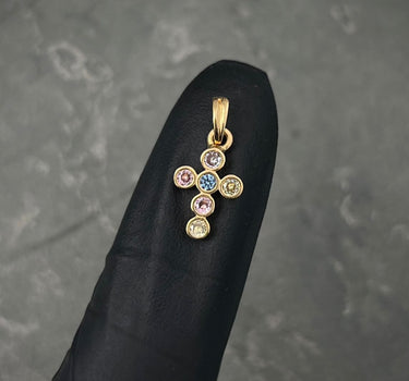 Dije cruz con swarovski azul y rosado 0.75gr / Largo 1.7cm / Oro Amarillo Nac B