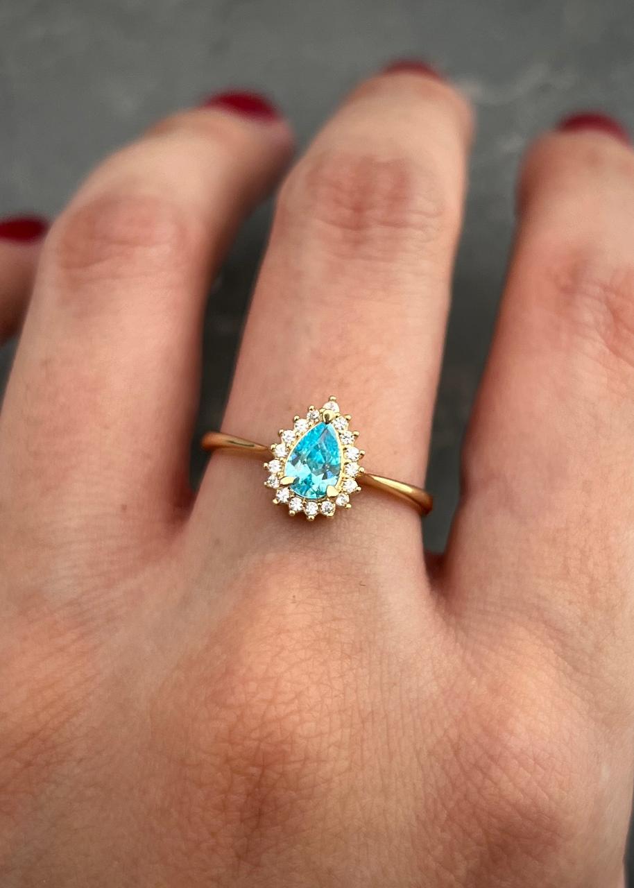 Solitario gota con swarovski azul y blanco 2.15gr / TALLA 6 1/2 / Oro Amarillo Nac P