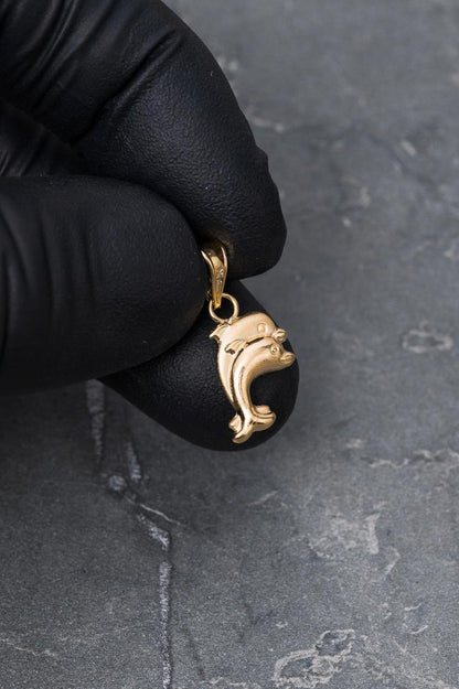 Dije de delfin 0.55gr / Largo 2.1cm — Oro Amarillo