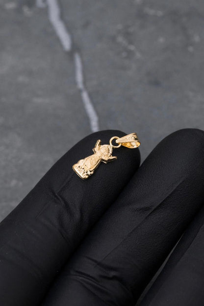 Dije divino niño 0.35gr / Largo 1.8cm / Oro Amarillo Nac M
