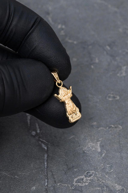 Dije divino niño 0.55gr / Largo 2.3cm / Oro Amarillo Nac B