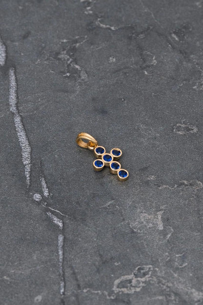 Dije cruz con swarovski azul 0.7gr / Largo 1.7cm — Oro Amarillo