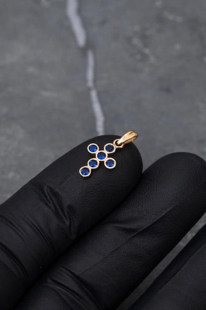 Dije cruz con swarovski azul 0.7gr / Largo 1.7cm — Oro Amarillo