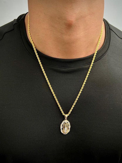 Dije virgen de guadalupe con swarovski blanco y negro 5.8gr / Largo 3.7cm / Oro Amarillo Nac B
