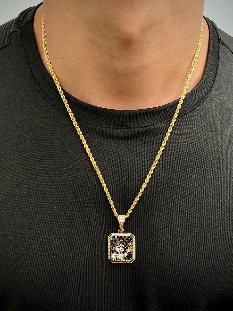 Dije tio rico con swarovski negro y blanco 12.45gr / Largo 4.7cm — Oro Amarillo