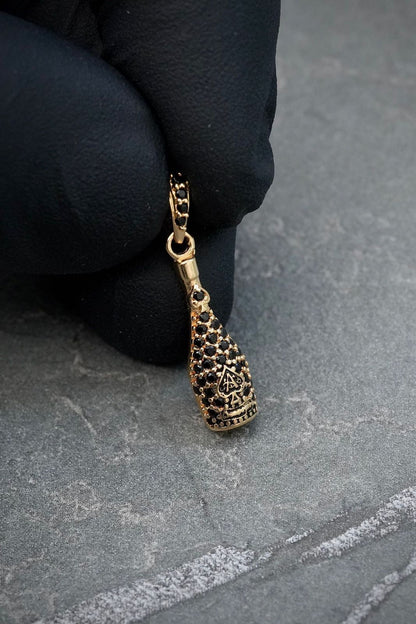 Dije botella con swarovski negro 1.4gr / Largo 2.2cm — Oro Amarillo
