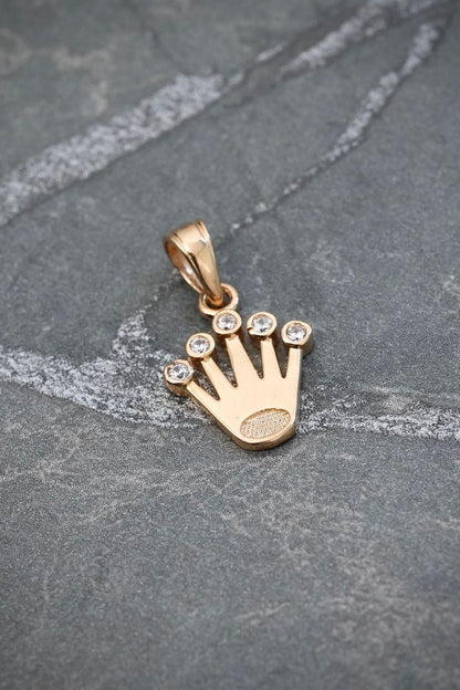 Dije corona rx con swarovski blanco 1.1gr / Largo 1.8cm / Oro Amarillo Nac B