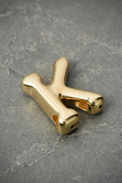 Dije letra k 0.8gr / Largo 1.7cm — Oro Amarillo