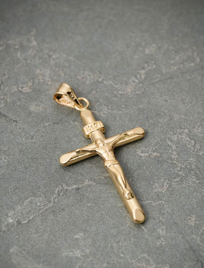 Dije cruz con cristo 1.1gr / Largo 3.3cm — Oro Amarillo