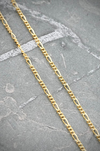 Cadena Figaro 1.65gr / 60cm / 1.5mm — Oro Amarillo