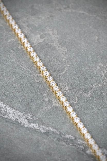 Pulso Tenis con Swarovski Blanco 2.45gr / 17cm / 1.8mm — Oro Amarillo