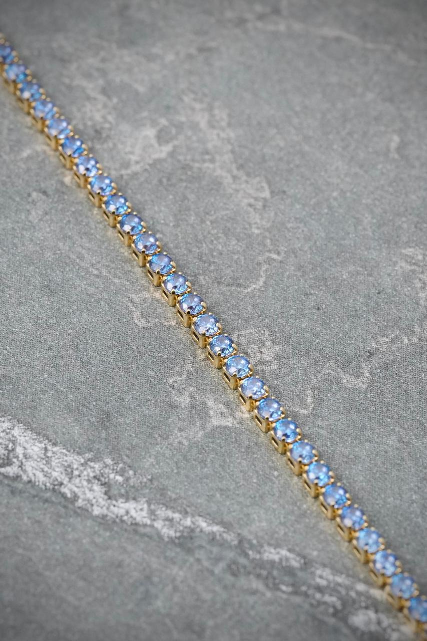 Pulso Tenis con Swarovski Azul 2.5gr / 18cm / 1.8mm — Oro Amarillo