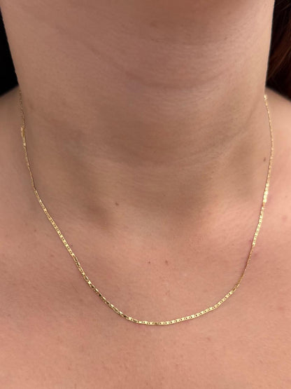 Cadena Plana 0.9gr / 45cm / 1.3mm — Oro Amarillo