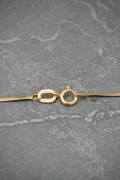 Cadena Mini Serpiente 1.25gr / 40cm / 1.2mm — Oro Amarillo