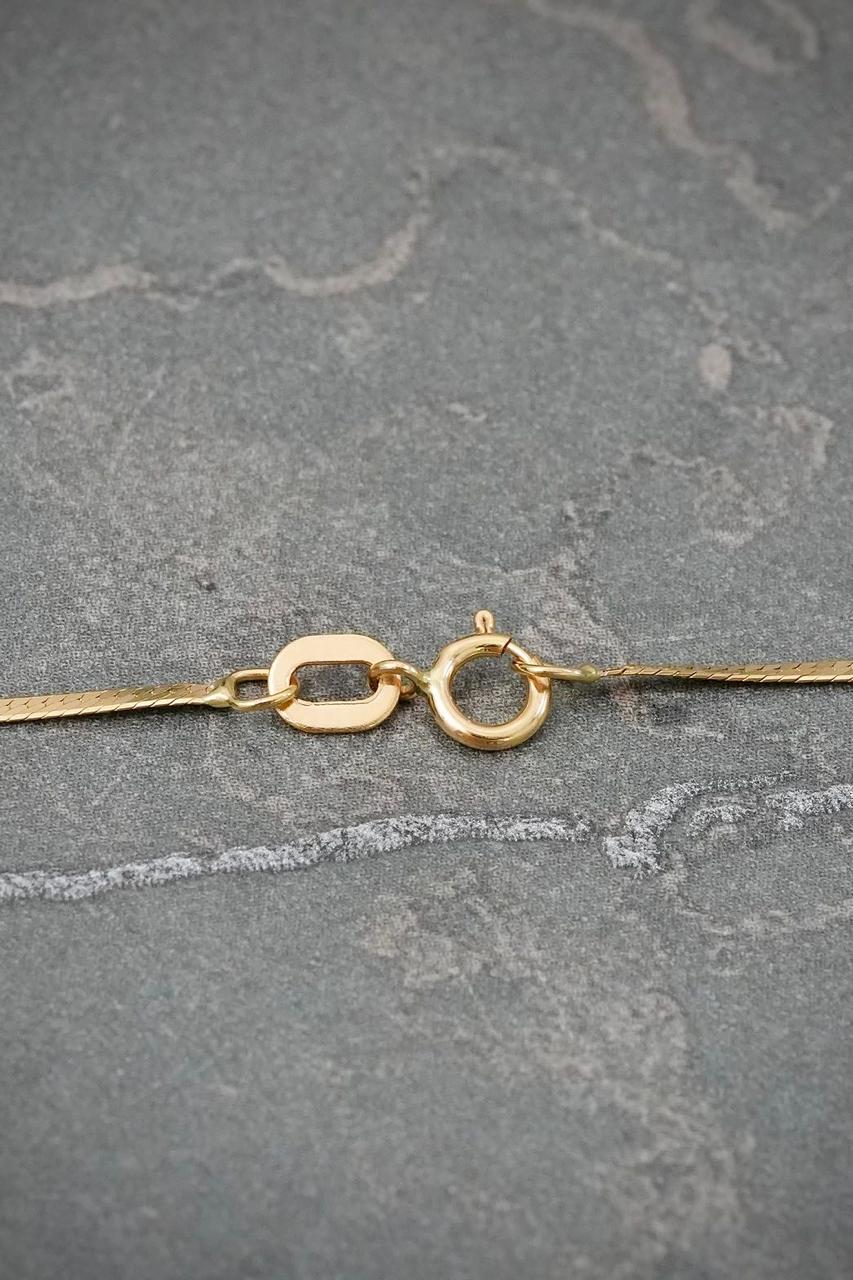 Cadena Mini Serpiente 1.25gr / 40cm / 1.2mm — Oro Amarillo