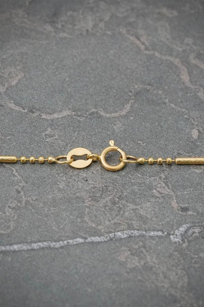 Cadena Palito Bolita 3.5gr / 60cm / 1.1mm — Oro Amarillo