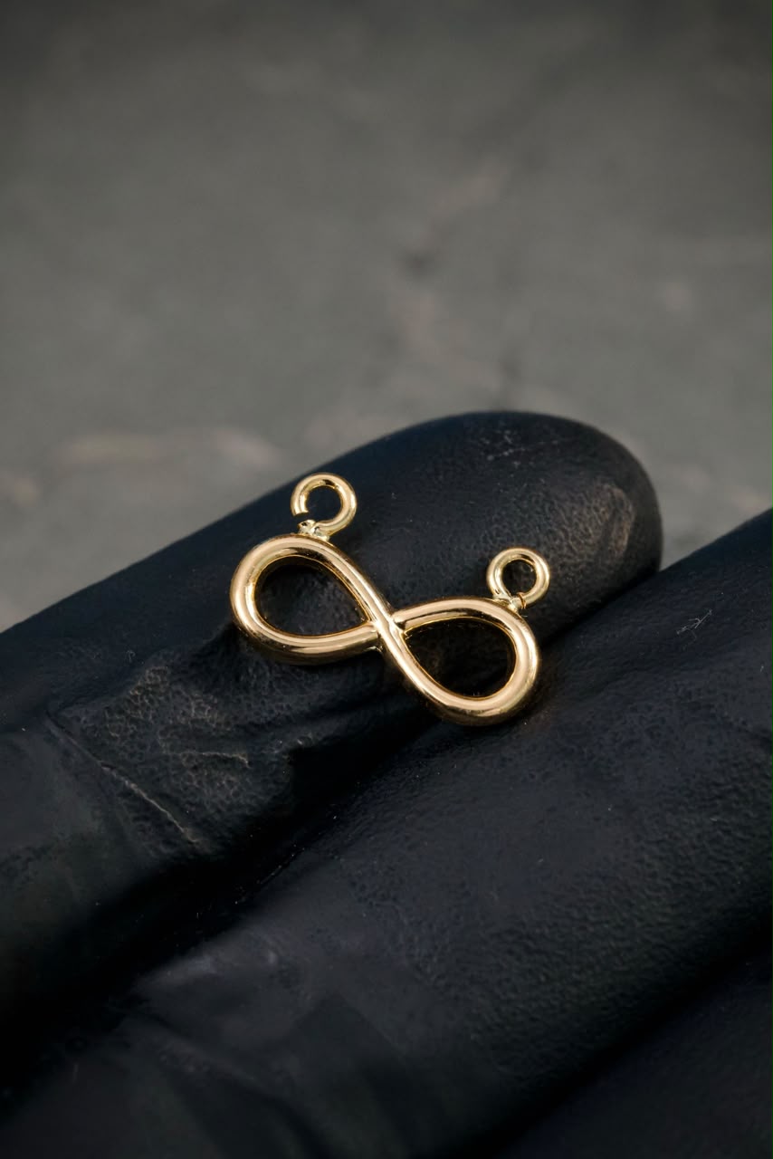 Herraje Infinito 0.45gr / 1.3cm / 9.3mm — Oro Amarillo
