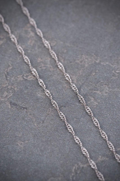 Cadena Singapur 0.9gr / 40cm / 1mm — Oro Blanco