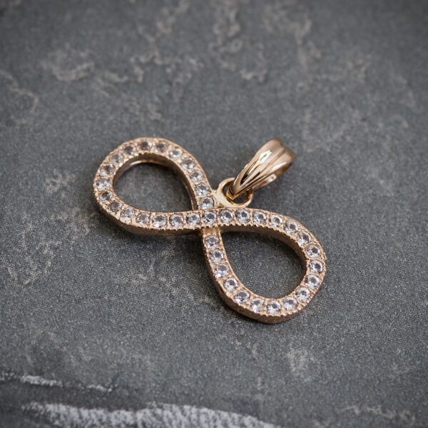 Dije infinito 1.2gr / 1.1cm / Oro Rosado Nac B