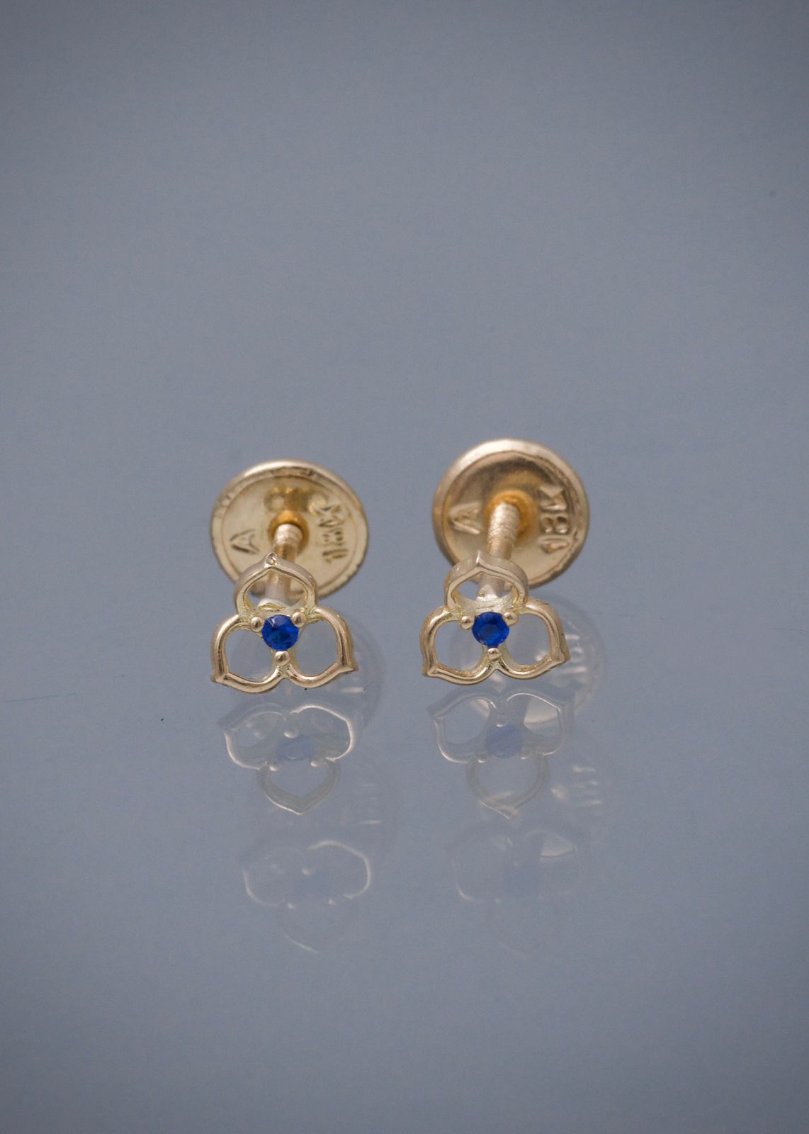 Topos flor con swarovski azul 0.55gr / Largo 0.5cm / Oro Amarillo Nac M