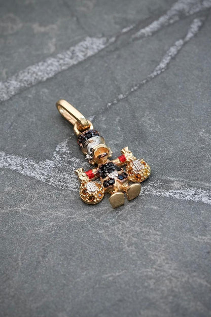 Dije tio rico con swarovski negro y amarillo 1.6gr / Largo 2.1cm — Oro Amarillo