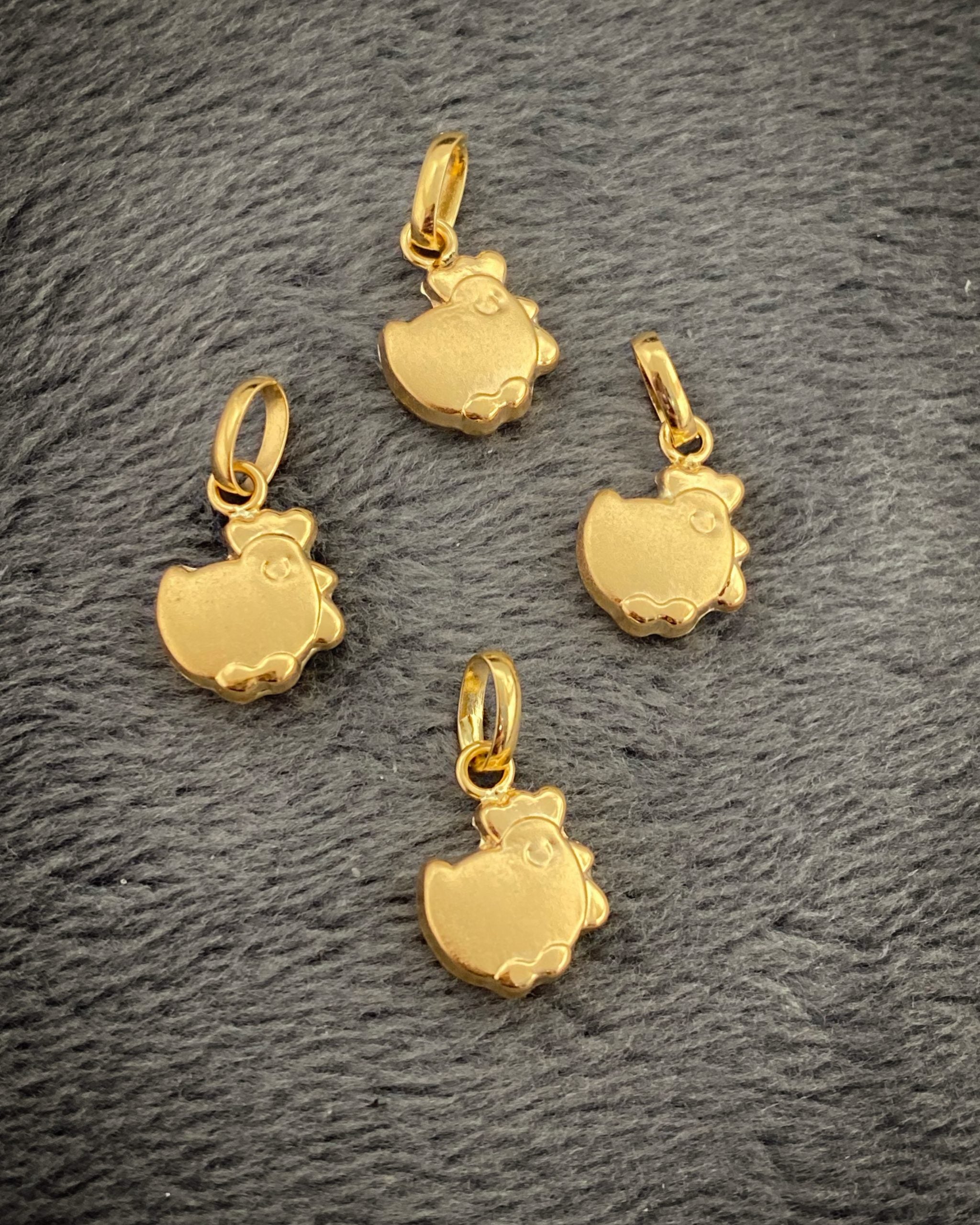 Dije de gallina 0.4gr / Oro Amarillo Nac B