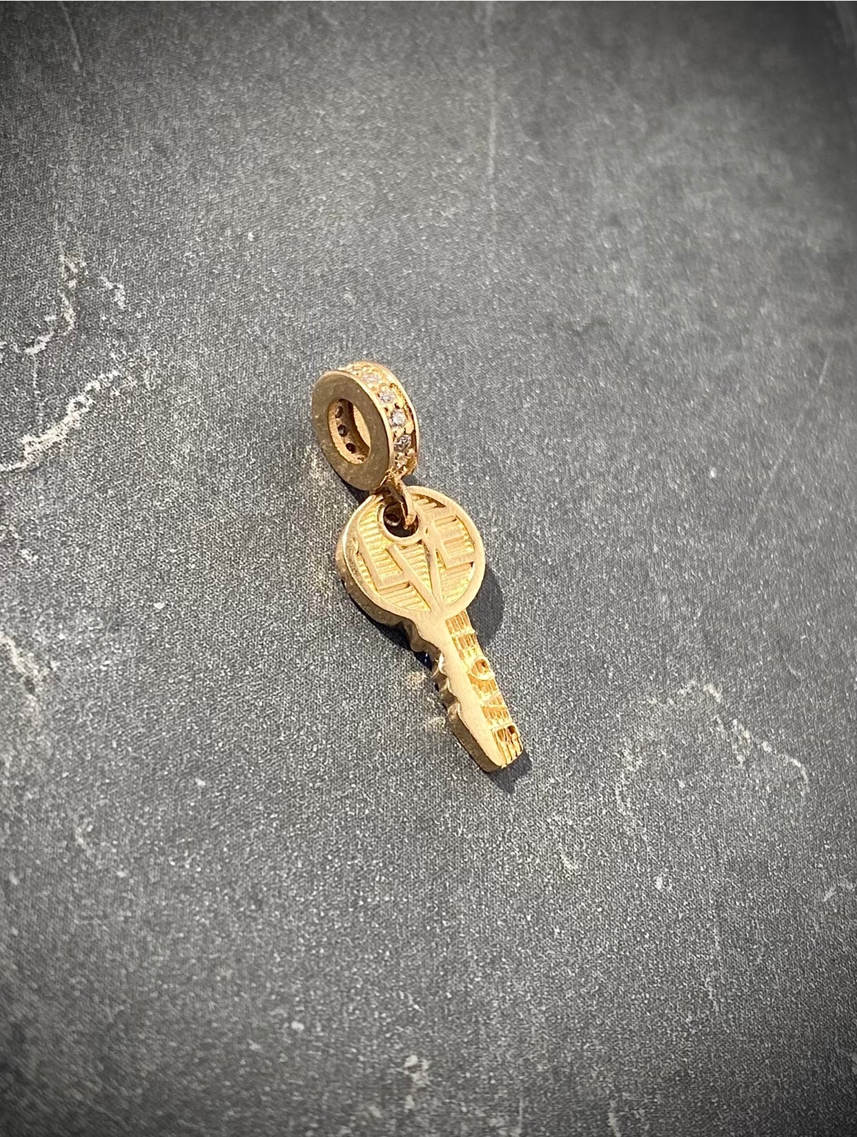 Dije de llave 1.6gr / 2.3cm / Oro Amarillo Nac B