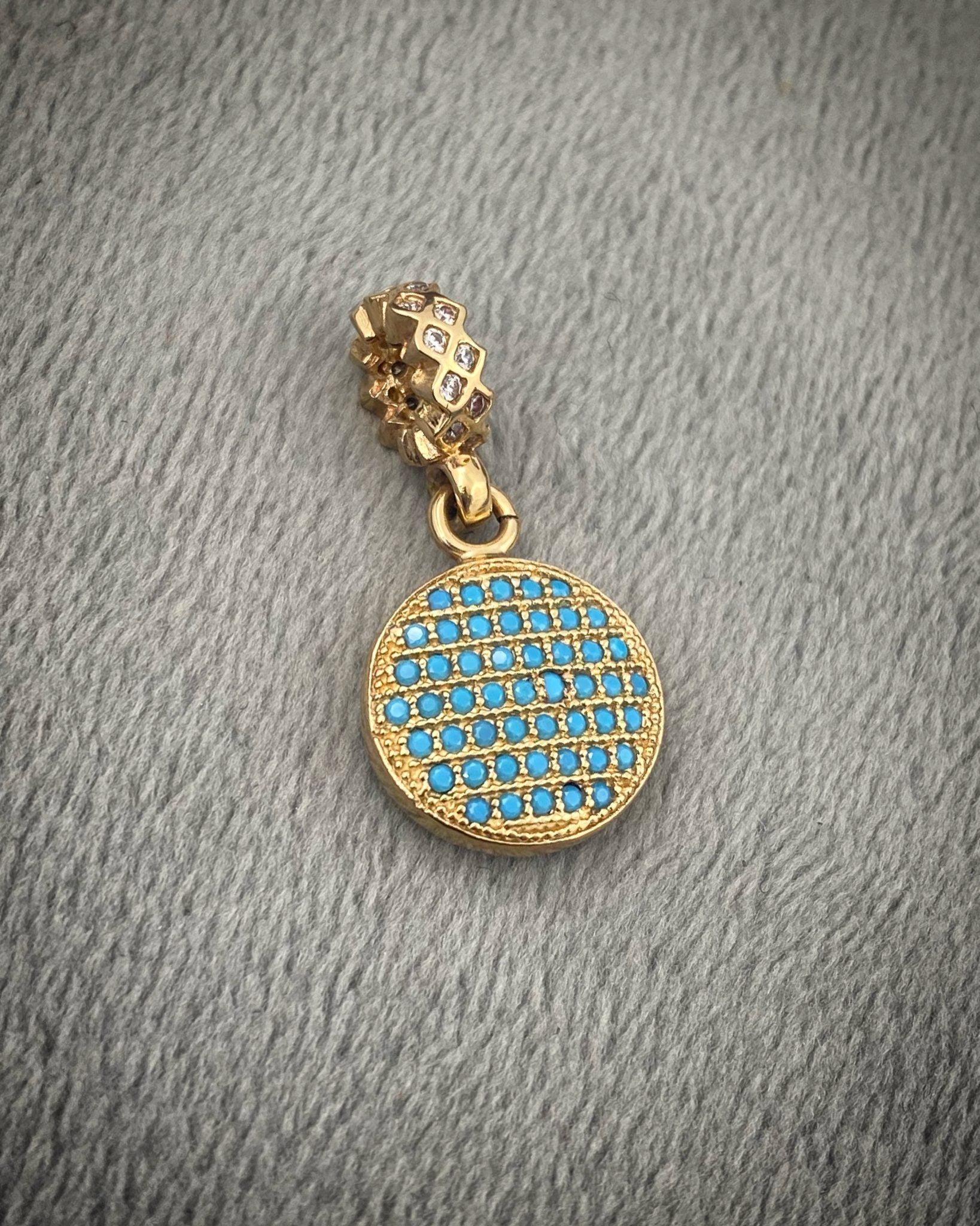 Dije redondo 2.8gr / 2.3cm / Oro Amarillo Nac B