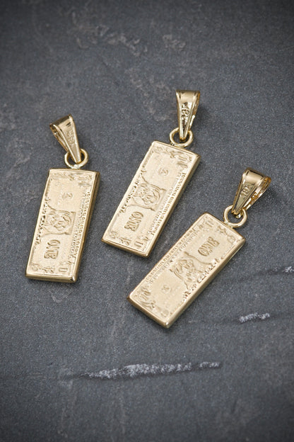 Dije de dolar 0.8gr / Largo 2.2cm / Oro Amarillo Nac B